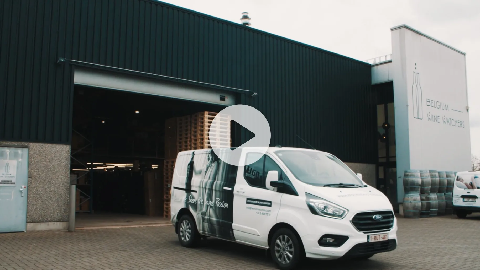Best Wine Auctions film thumbnail showing the Belgium Wine Watchers facility and wine transport van